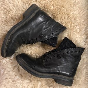 Black moto style boots with rhinestone tongue.